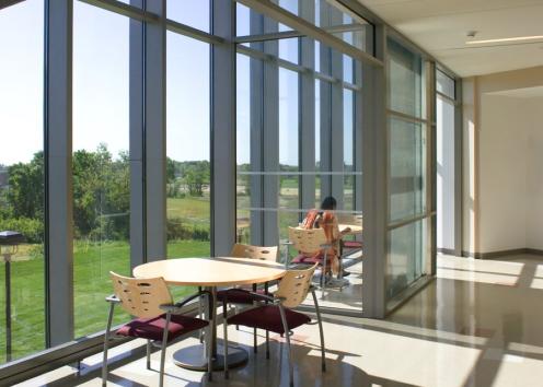 student sitting in study nook on 2nd floor of MRB